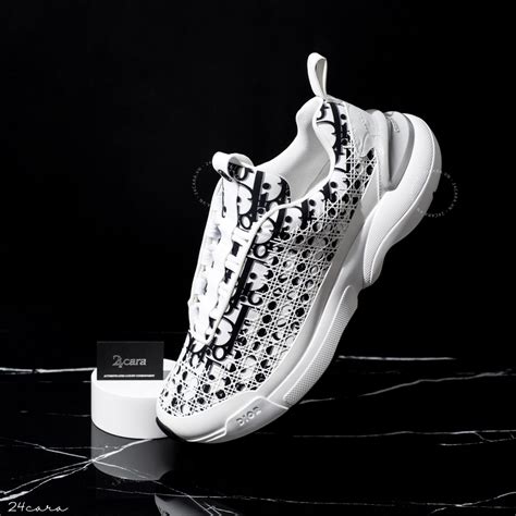 white dior oblique b24 sneaker with cannage motif|black Dior oblique sneaker.